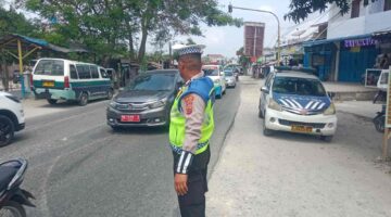 Satlantas Polres Batu Bara Lakukan Gatur Siang di Jalinsum Simpang Tanah Merah – Kegiatan Aman Lancar